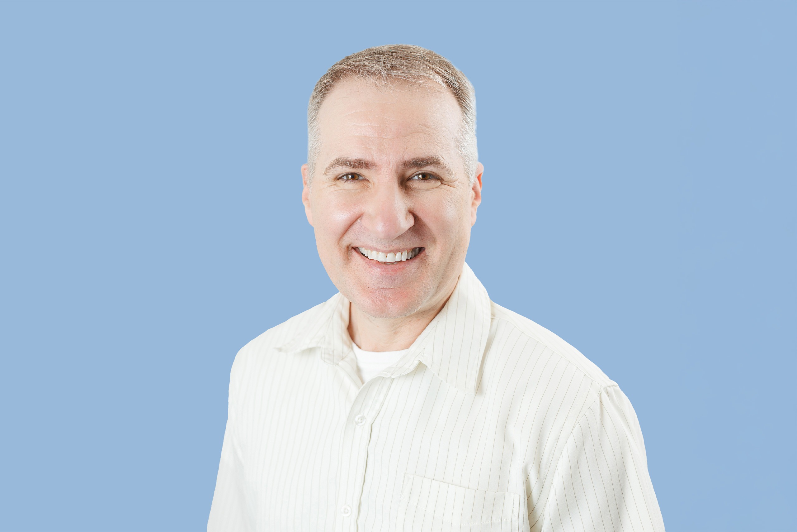Meet Dr. Roman Koutsil | Shawnessy Smiles | General and Family Dentist SW Calgary